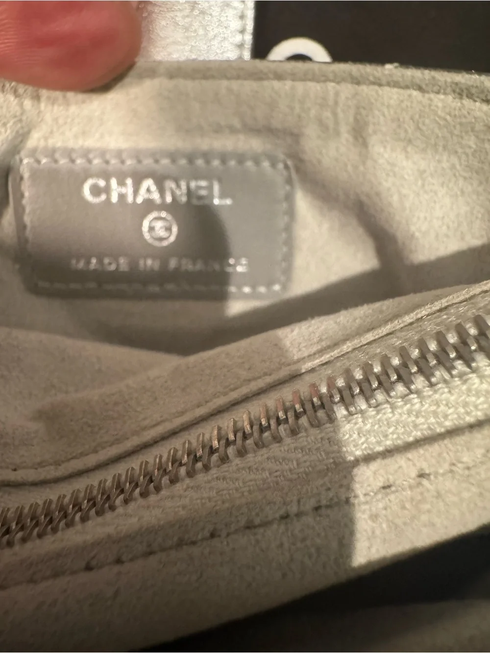 CHANEL Silver Quilted Leather O-Phone Holder with Pearl Chain.